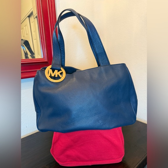 Michael Kors Handbags - Michael Kors NWOT Navy Blue Leather
Fulton East West Tote! Large pristine!